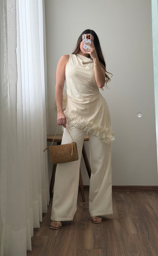 Blusa beige olan abajo
